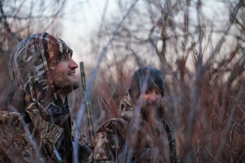 Two hunters in camouflage