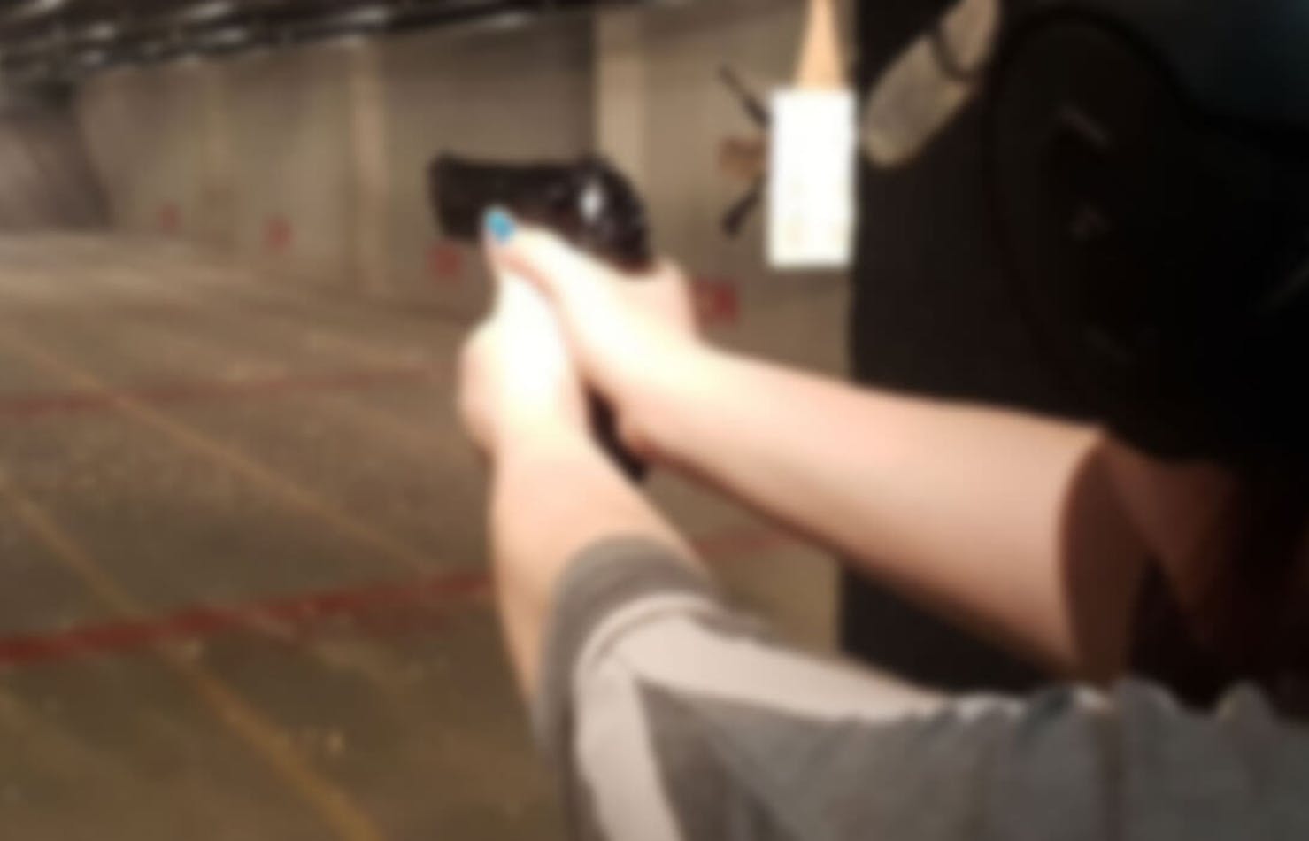 Pistol shooter at range