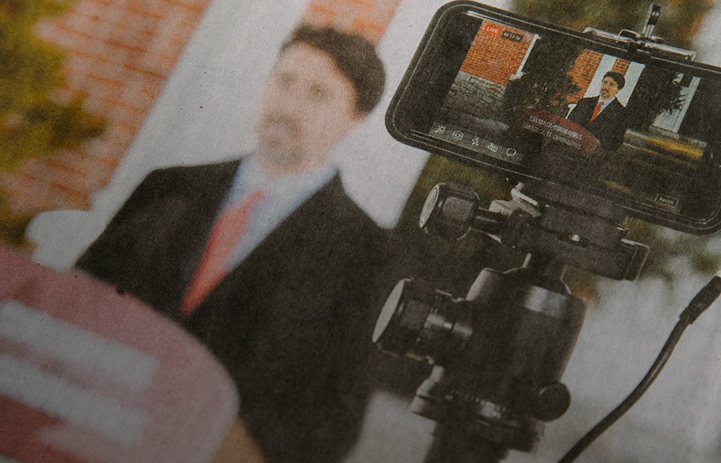 Close up of a phone filming the Prime Minister of Canada